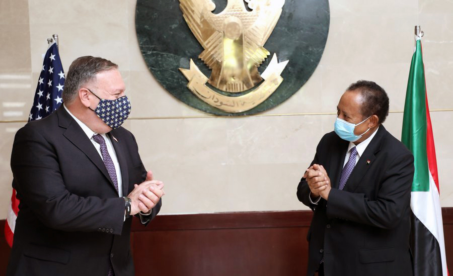U.S. Secretary of State Mike Pompeo with Sudanese Prime Minister Abdalla Hamdok on August 25, 2020 in Khartoum. Anadolu Agency via Getty Images.
